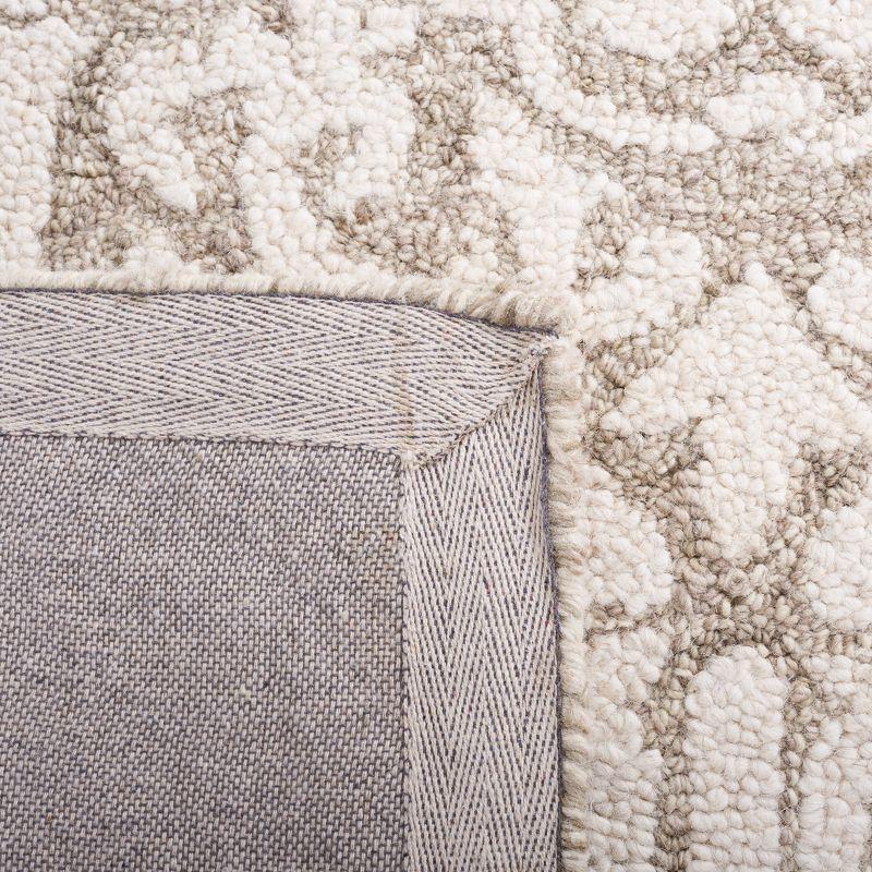 Ivory Abstract Tufted Wool 8' x 10' Rectangular Area Rug