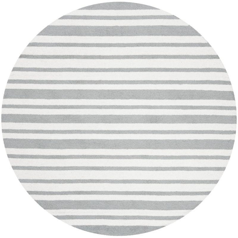 Safavieh Kids SFK917 Hand Tufted Area Rug  - Safavieh