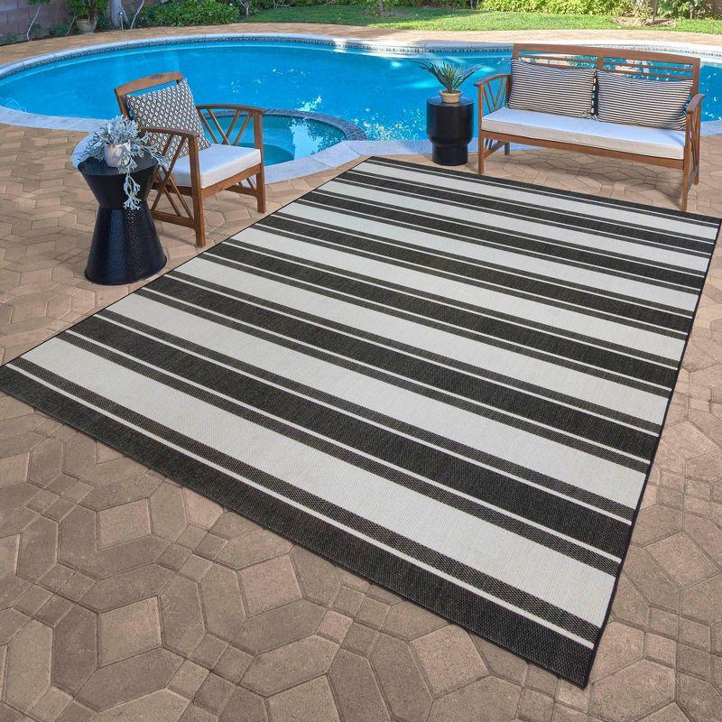 Coastal Charm Black and White Stripe 9' x 12' Synthetic Area Rug