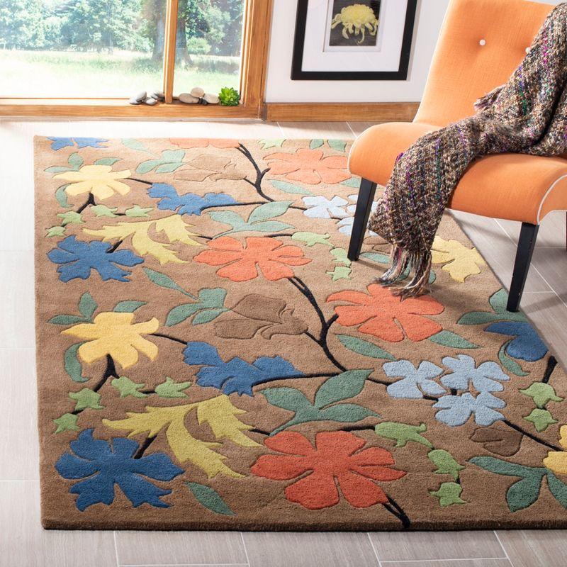 Handmade Blue Floral Tufted Wool Area Rug, 5' x 8'