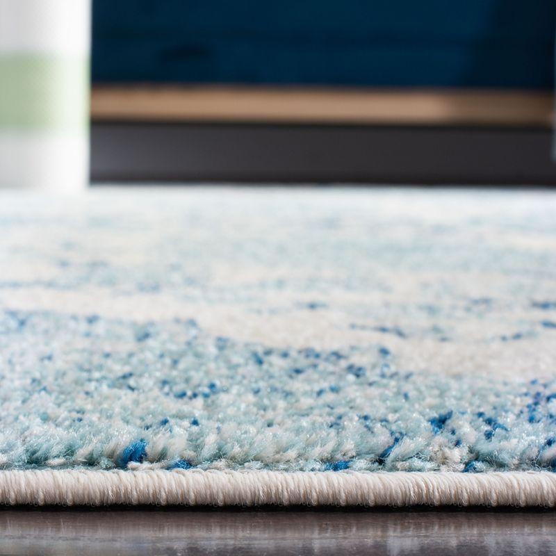 Beige and Turquoise 4' x 6' Synthetic Reversible Area Rug