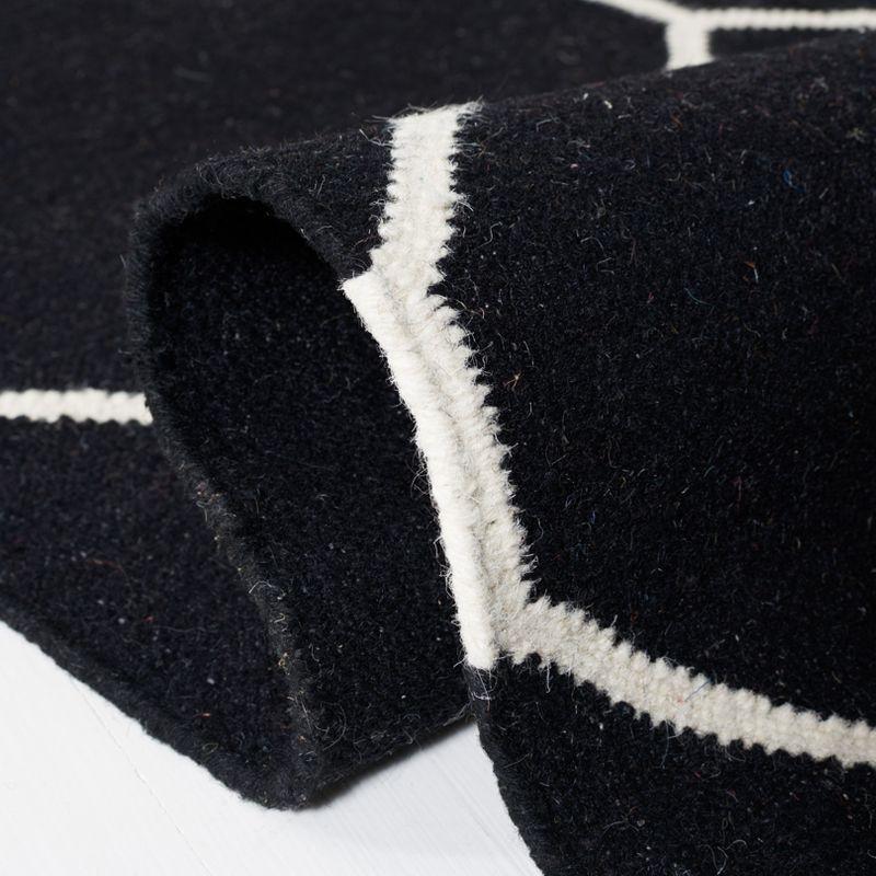 Dhurries DHU635 Hand Woven Area Rug - Black/Ivory - 4'x6' - Safavieh.