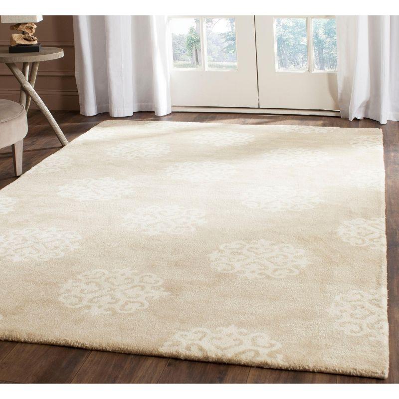 Handmade Beige/Ivory Tufted Wool-Viscose Blend Area Rug 9' x 12'