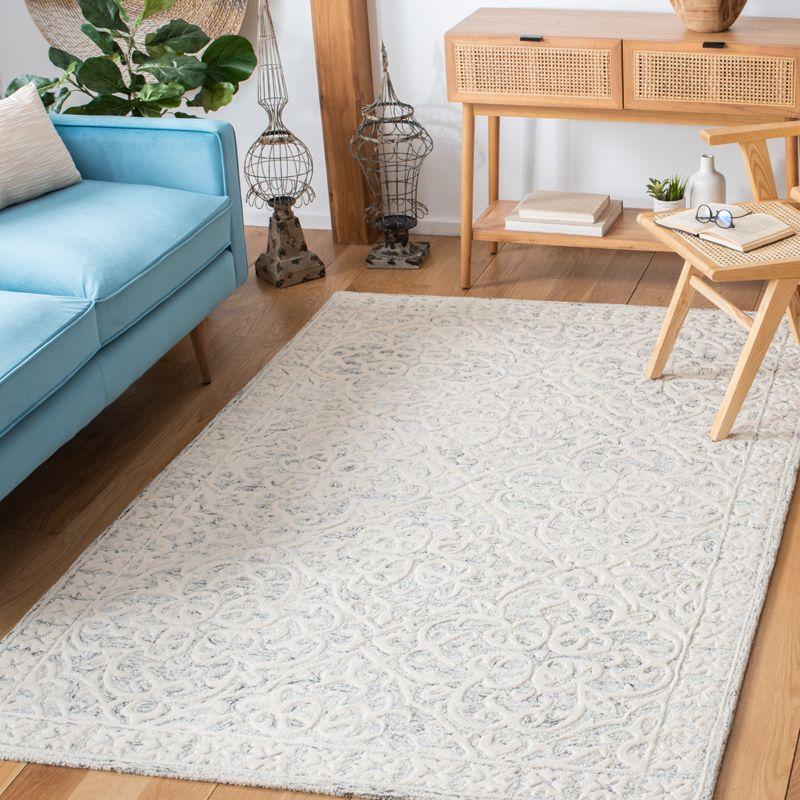 Metro MET857 Hand Tufted Indoor Area Rug - Silver/Ivory - 5'x8' - Safavieh