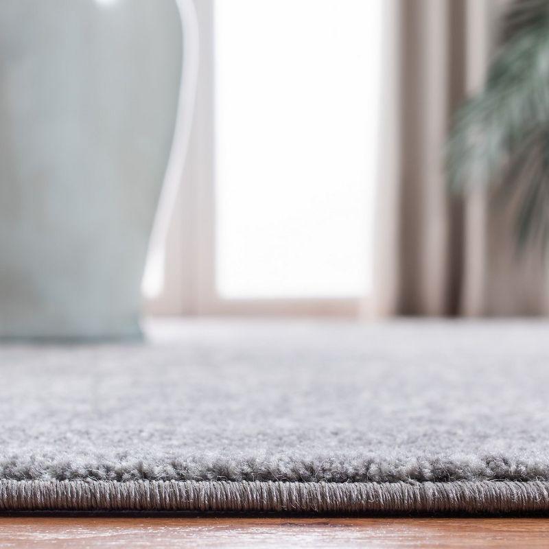 Evoke EVK256 Power Loomed Indoor Area Rug - Silver/Ivory - 6'7"x9' - Safavieh