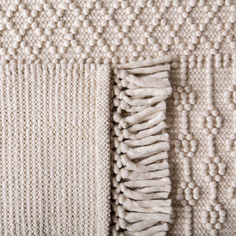 Ivory Coast Hand-Tufted Wool Braided 27" Pouf