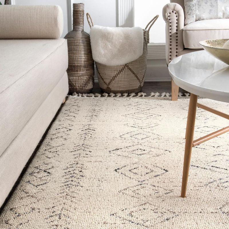 Ivory Braided Rectangular Synthetic Area Rug with Tassels