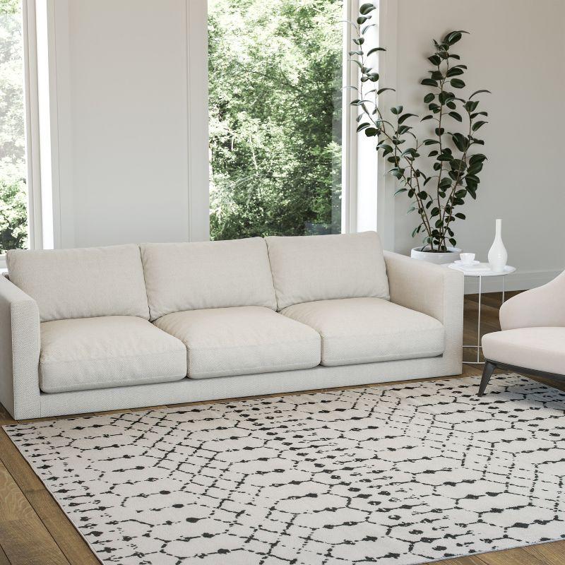 Emma and Oliver Modern Design Geometric Bohemian Low Pile 8' x 10' Ivory And Black Area Rug
