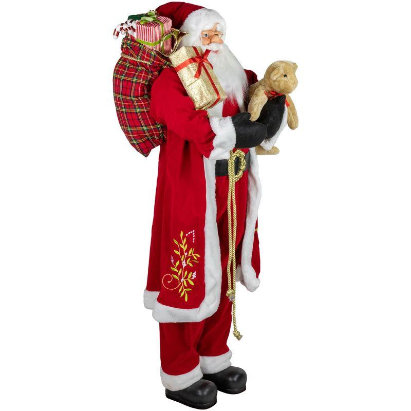 Northlight 5' Traditional Santa Claus with Teddy Bear and Gift Bag Standing Christmas Figure