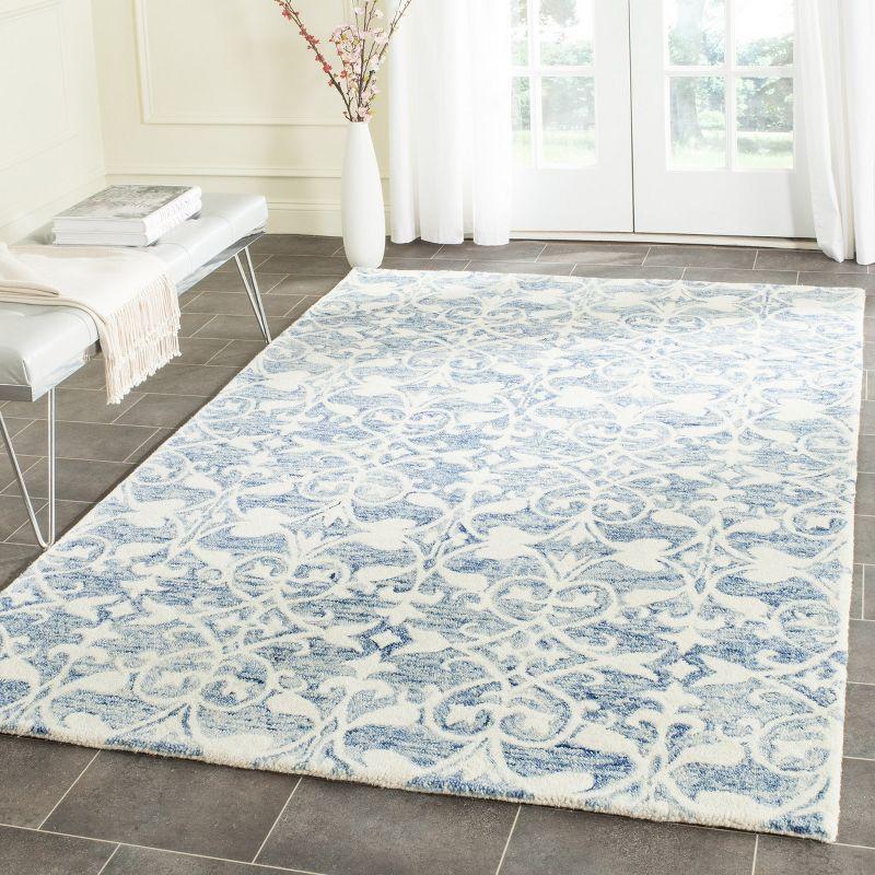 Ivory and Dark Blue Hand-Tufted Wool 4' x 6' Area Rug