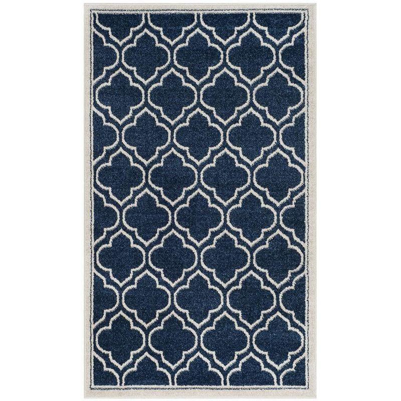 Navy and Ivory Geometric Pattern Low Pile Area Rug