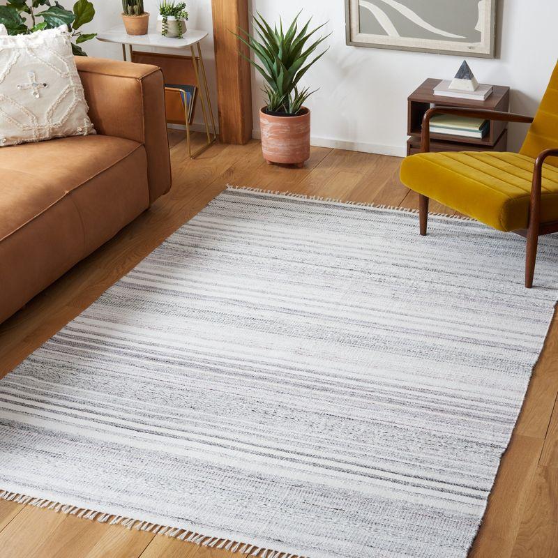 Ivory and Light Gray Handwoven Synthetic Area Rug 8' x 10'