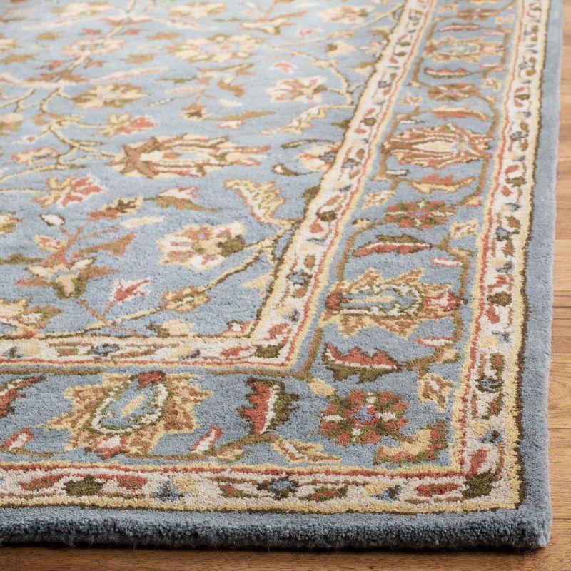 Elegant Heritage Blue Rectangular Hand-Tufted Wool Area Rug, 9' x 12'