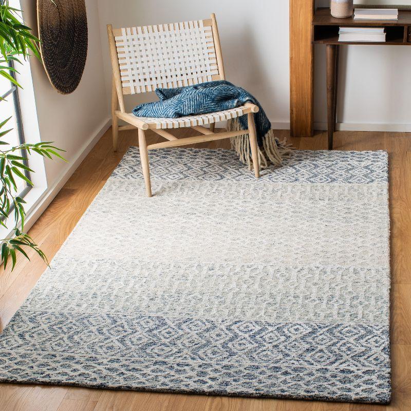 Handmade Blue Wool and Viscose 8' x 10' Tufted Area Rug