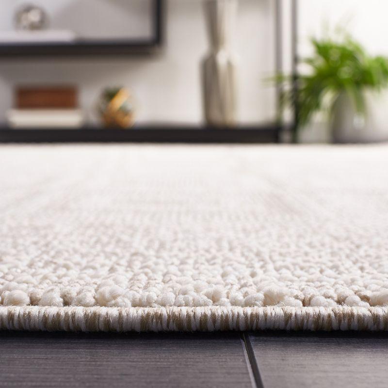 Ivory Geometric Flat Woven Synthetic Area Rug