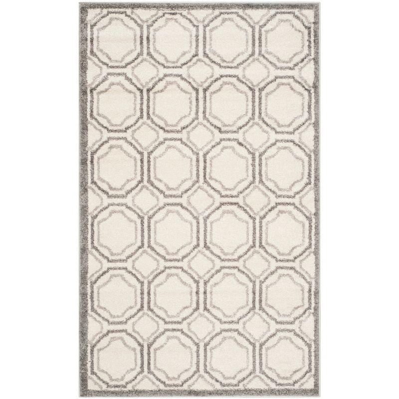 Ivory and Light Grey Geometric Synthetic Area Rug