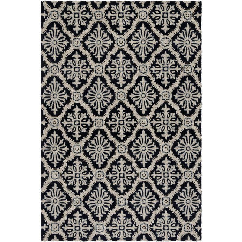 Taran Easy Care Hand Hooked Performance Geometric Rug