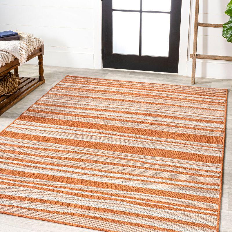 5' x 8' Castara Wavy Stripe Modern Indoor/Outdoor Area Rug, Orange/Cream - JONATHAN Y