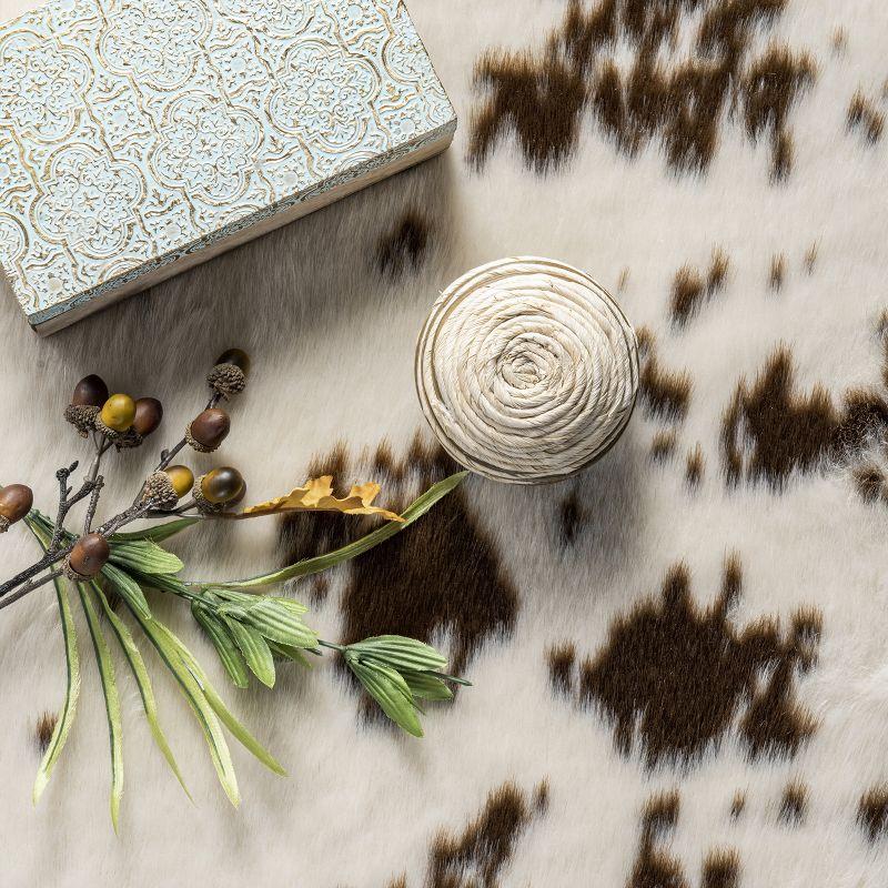 Nuloom Marcia SpinClean Machine Washable Faux Cowhide Area Rug, Shaped 3' 10" x 5', Brown