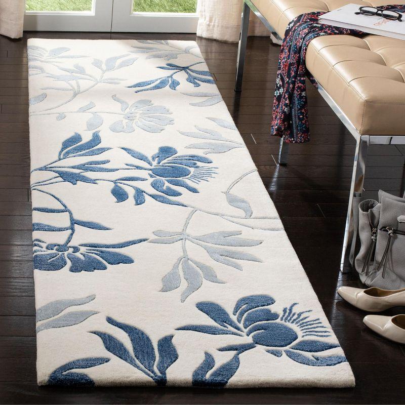 Capri CPR345 Hand Tufted Runner Rug - Ivory/Blue - 2'3"x9' - Safavieh.
