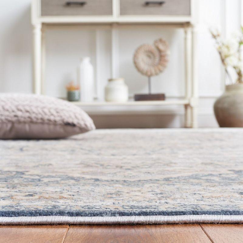 Cosmopolitan 600 CSM684 Power Loomed Indoor Area Rug - Cream/Blue - 9'x12' - Safavieh