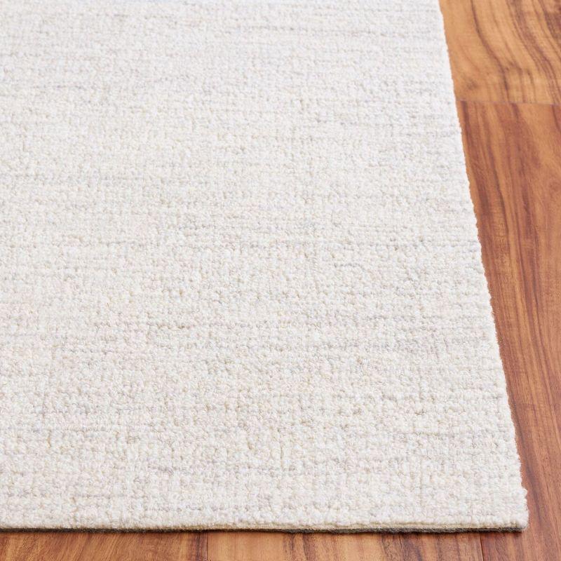 Ebony EBN353 Hand Tufted Area Rug - Light Grey/Ivory - 5'x8' - Safavieh.