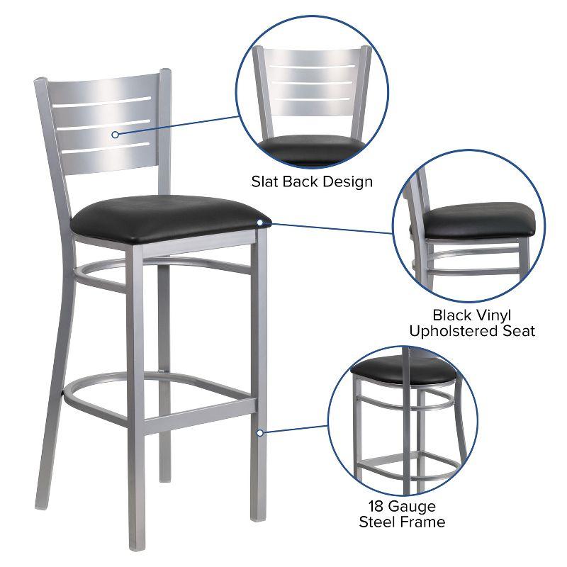 Sleek Silver Slat-Back Barstool with Black Vinyl Seat