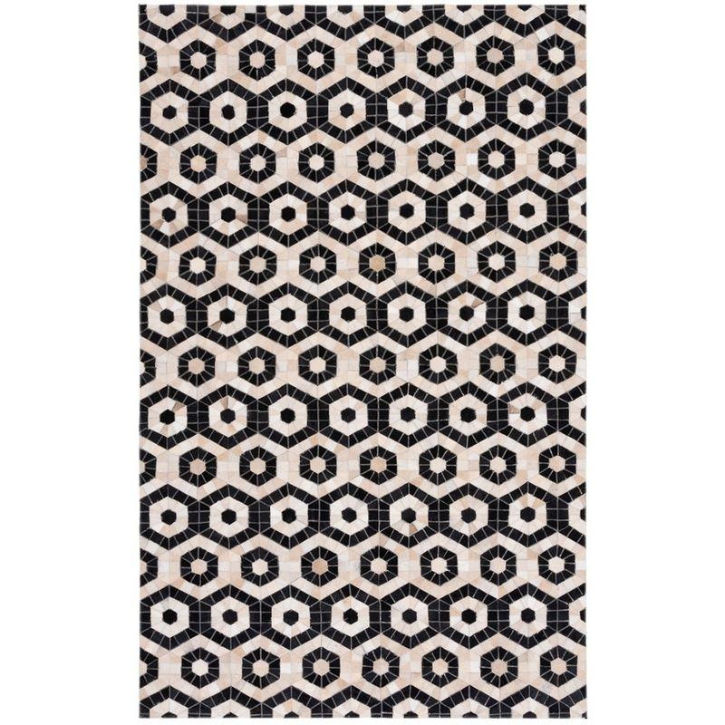 Black and Beige Geometric Handmade Cowhide Area Rug