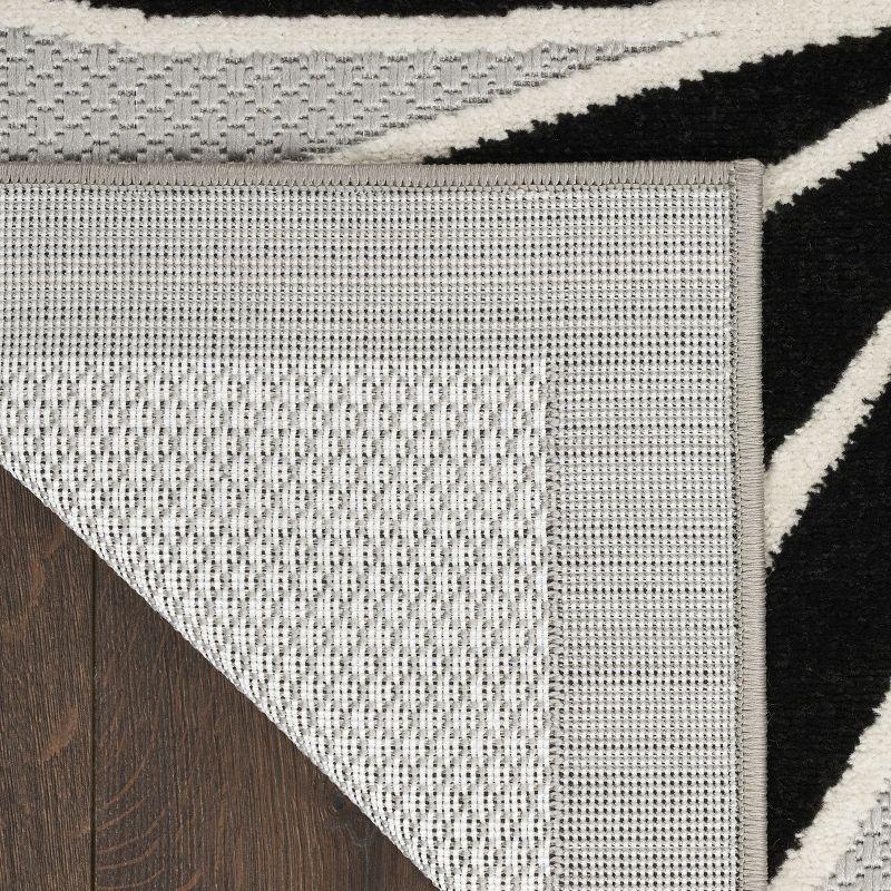 Nourison Aloha Daisy Flower Flatweave High-Low Indoor Outdoor Area Rug Black White 5'3" x 7'5"
