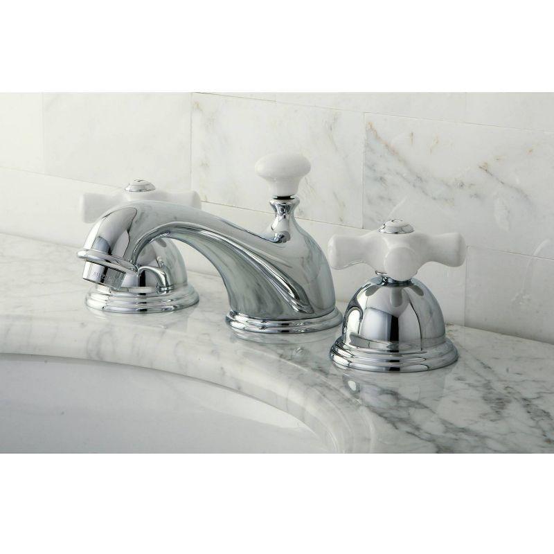 Kingston Brass Restoration Two-Handle 3-Hole Deck Mount Widespread Bathroom Faucet with Brass Pop-Up Drain