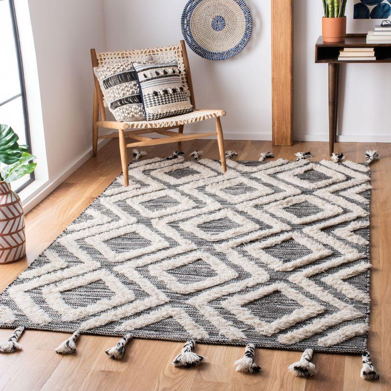 Kenya KNY331 Hand Tufted Area Rug - Black/Ivory - 5'x8' - Safavieh.