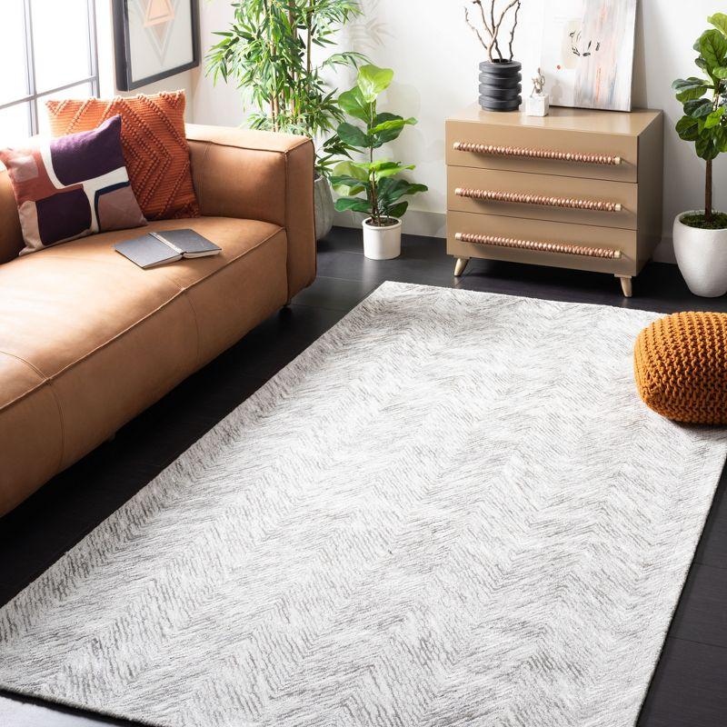 Soho SOH175 Hand Tufted Area Rug  - Safavieh