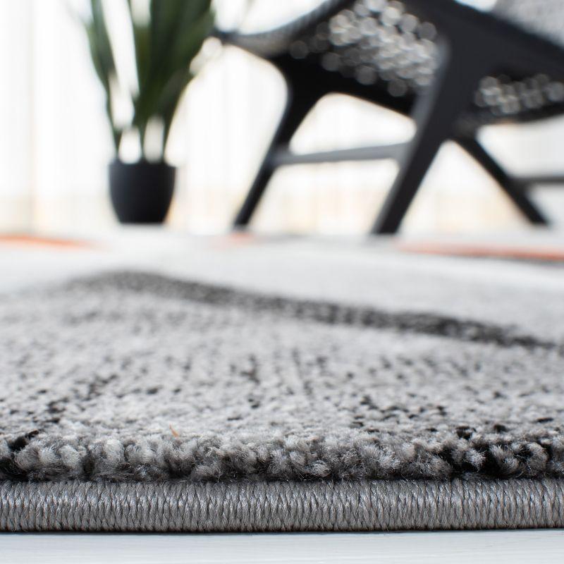 Hollywood HLW710 Machine Made Area Rug - 9'x12' - Grey/Orange - Safavieh
