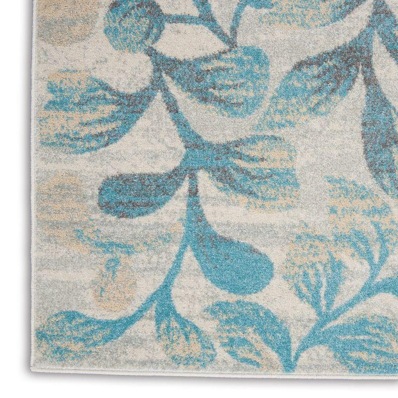 Ivory and Turquoise Floral Synthetic 4' x 6' Area Rug