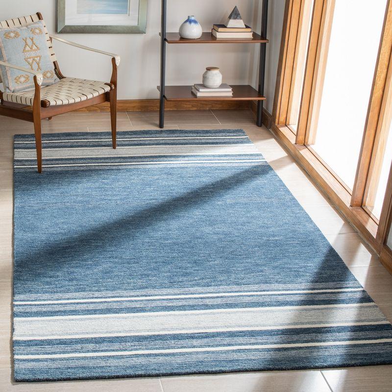 Blue and Ivory Hand-Tufted Wool 4' x 6' Area Rug