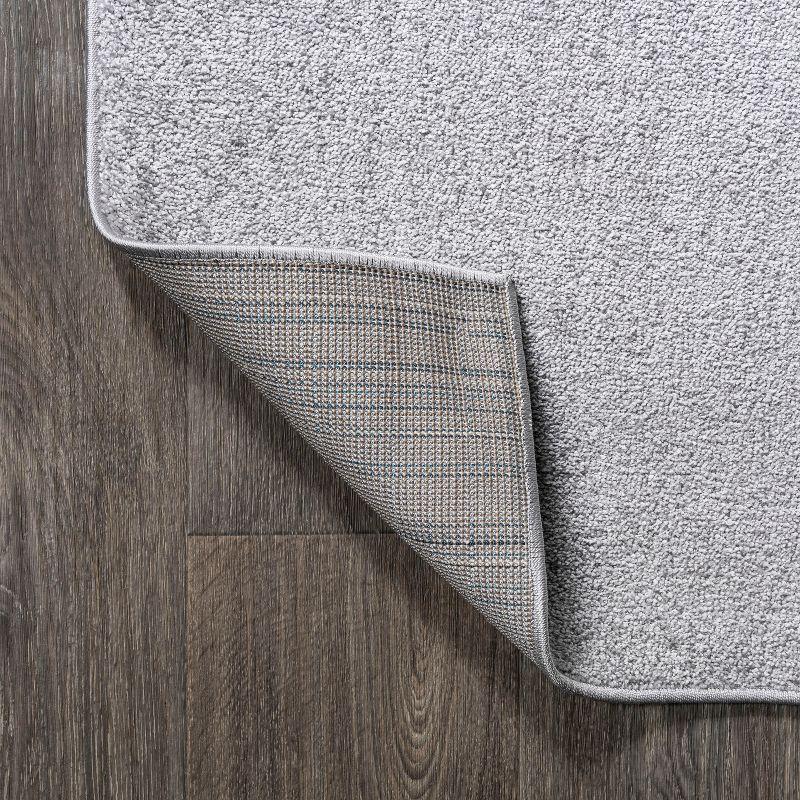 5'x8' Haze Solid Low-Pile Area Rug, Light Gray - JONATHAN Y