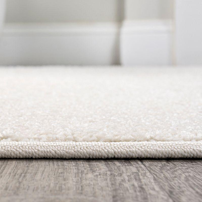 3'x5'Oval  Haze Solid Low-Pile, Cream - JONATHAN Y
