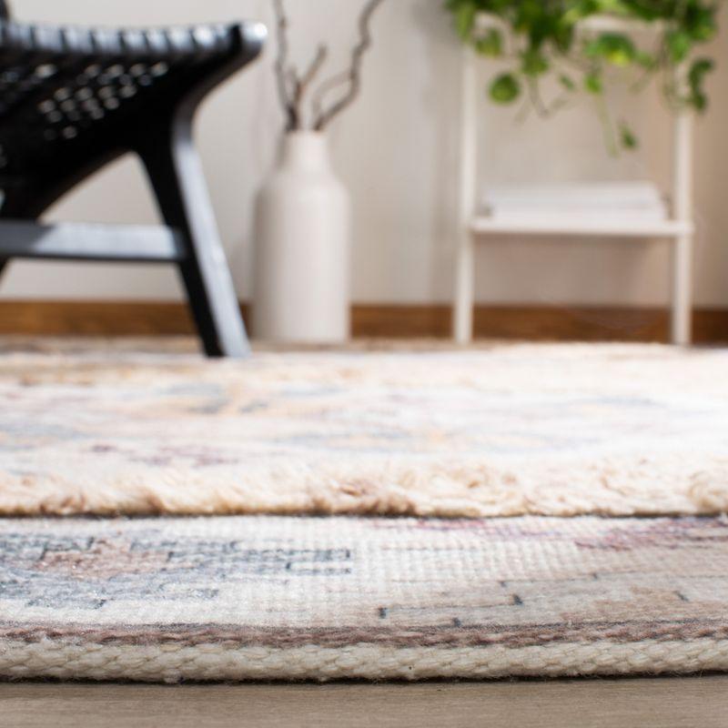 Ivory and Taupe Hand Loomed Wool Area Rug