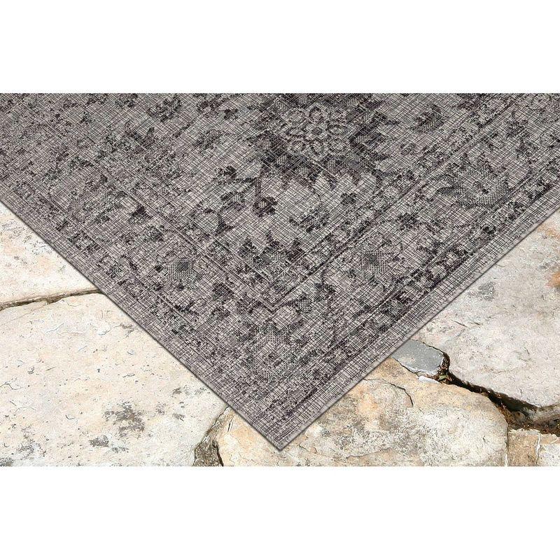 Carmel 24" Black Synthetic Flat Woven Floral Rug