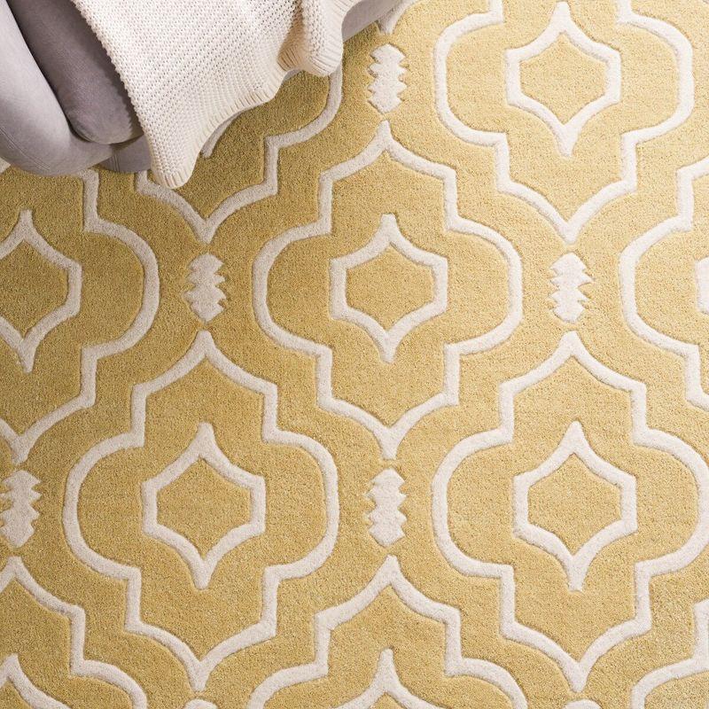 Chatham CHT736 Hand Tufted Area Rug Light Gold / Ivory 5' X 8' - Safavieh.