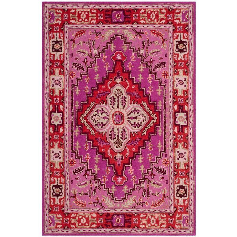 Handmade Bohemian Chic Red & Pink Wool Area Rug - 4' x 6'