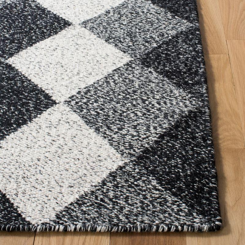 Handmade Black and Ivory Wool Flat Woven Area Rug