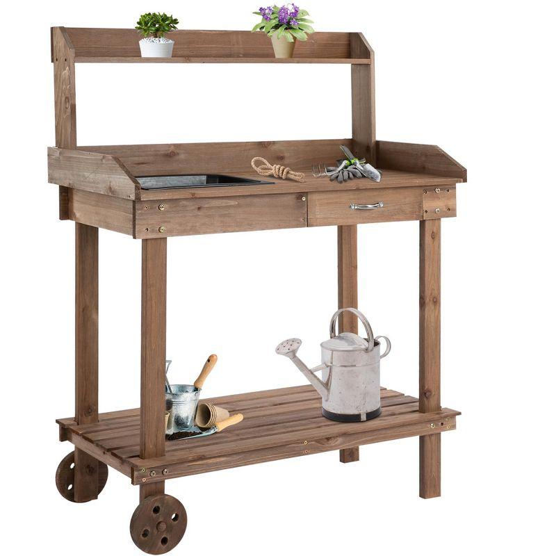 Outsunny 36'' Wooden Potting Bench Work Table with 2 Removable Wheels, Sink, Drawer & Large Storage Spaces, Brown