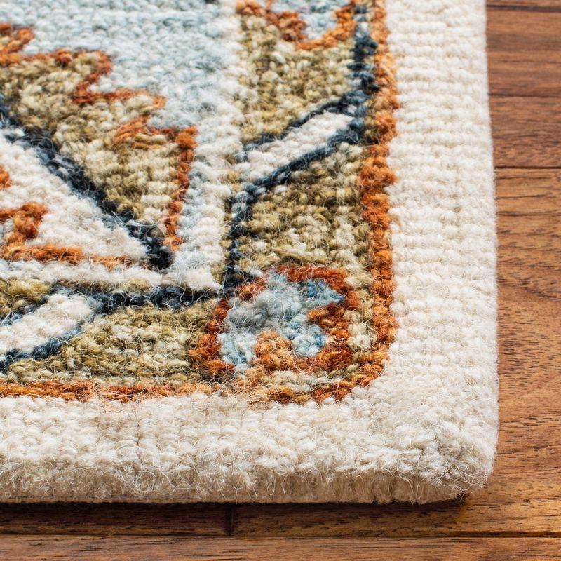 Capri CPR209 Hand Tufted Area Rug - Ivory/Rust - 7'x7' - Safavieh.