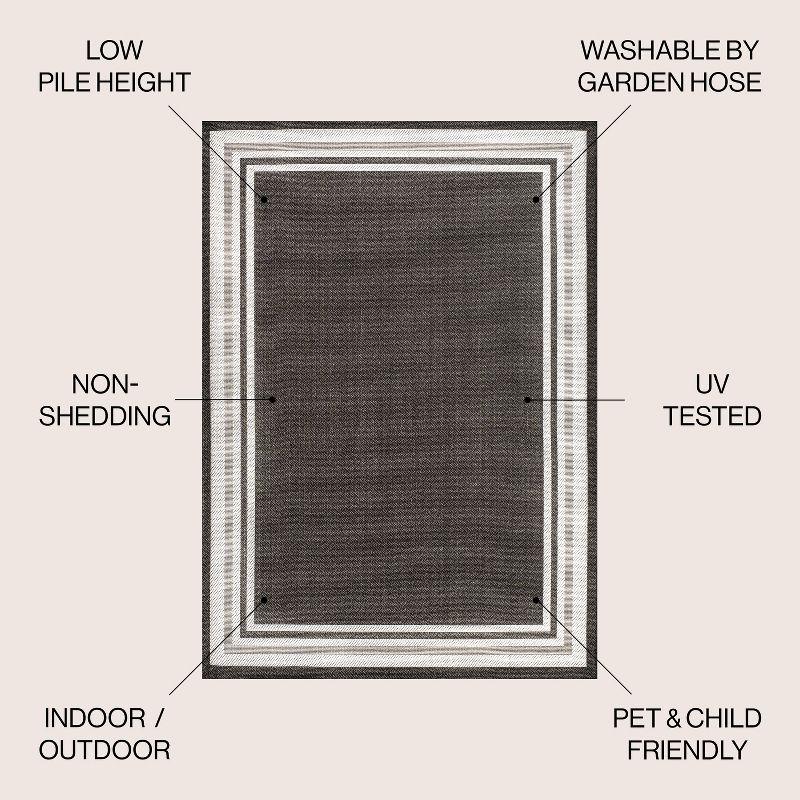 5' x 8' James Modern Border Stripe Indoor/Outdoor Area Rug, Black/Cream - JONATHAN Y