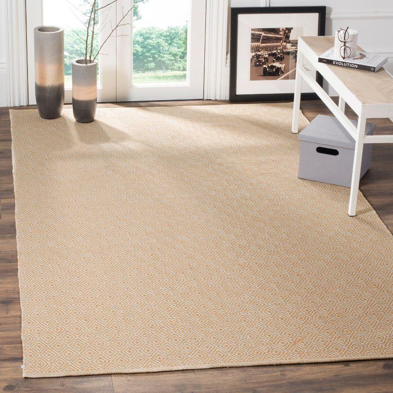 Coastal Charm Gold Geometric Hand-Woven Cotton Area Rug