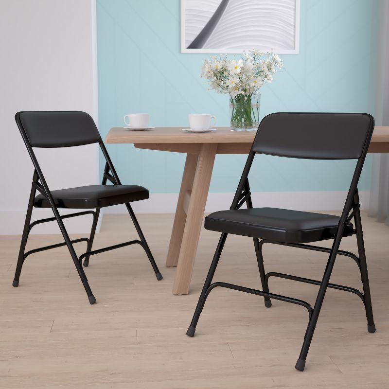 Black Metal Folding Chairs with Padded Vinyl Seats, Set of 2