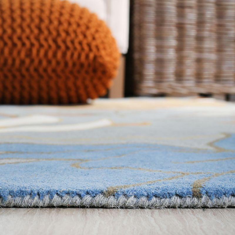 Handmade Blue and Multi Wool Tufted Area Rug