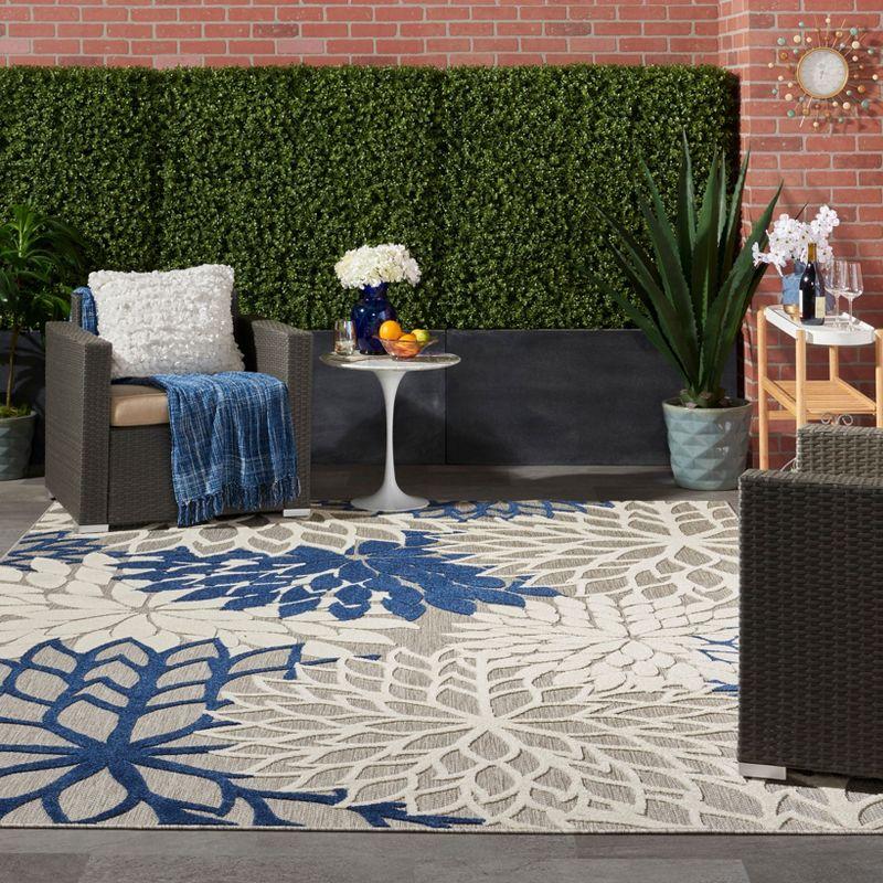 Nourison Aloha Floral Bloom Flatweave High-Low Indoor Outdoor Area Rug Ivory/Navy 7'10" x 10'6"
