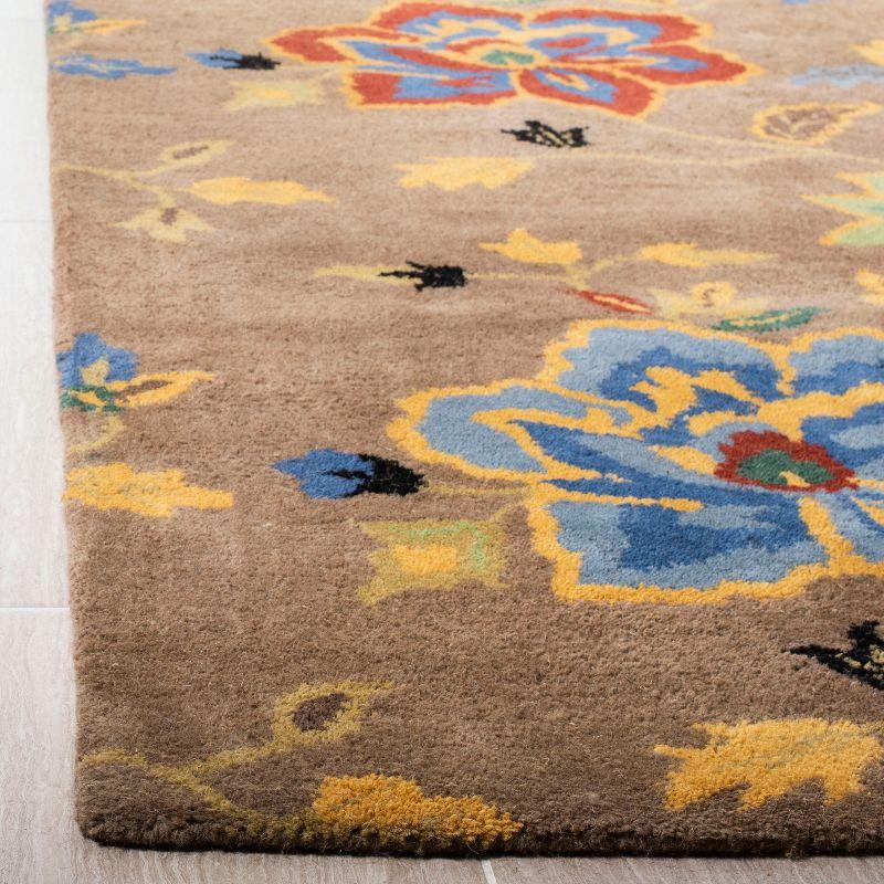 Soho SOH847 Hand Tufted Area Rug  - Safavieh